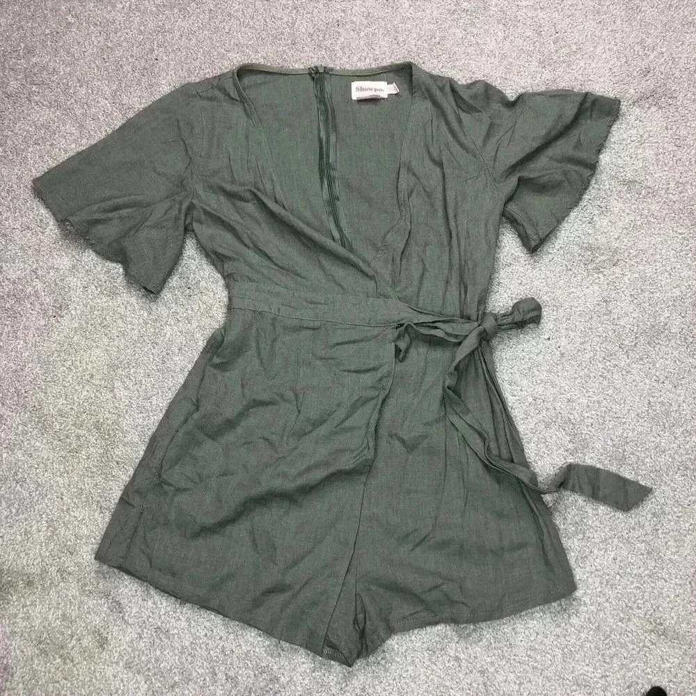 Showpo. Romper Green Color Short Sleeves Size 6 Skirted Waist Tie V Neckline